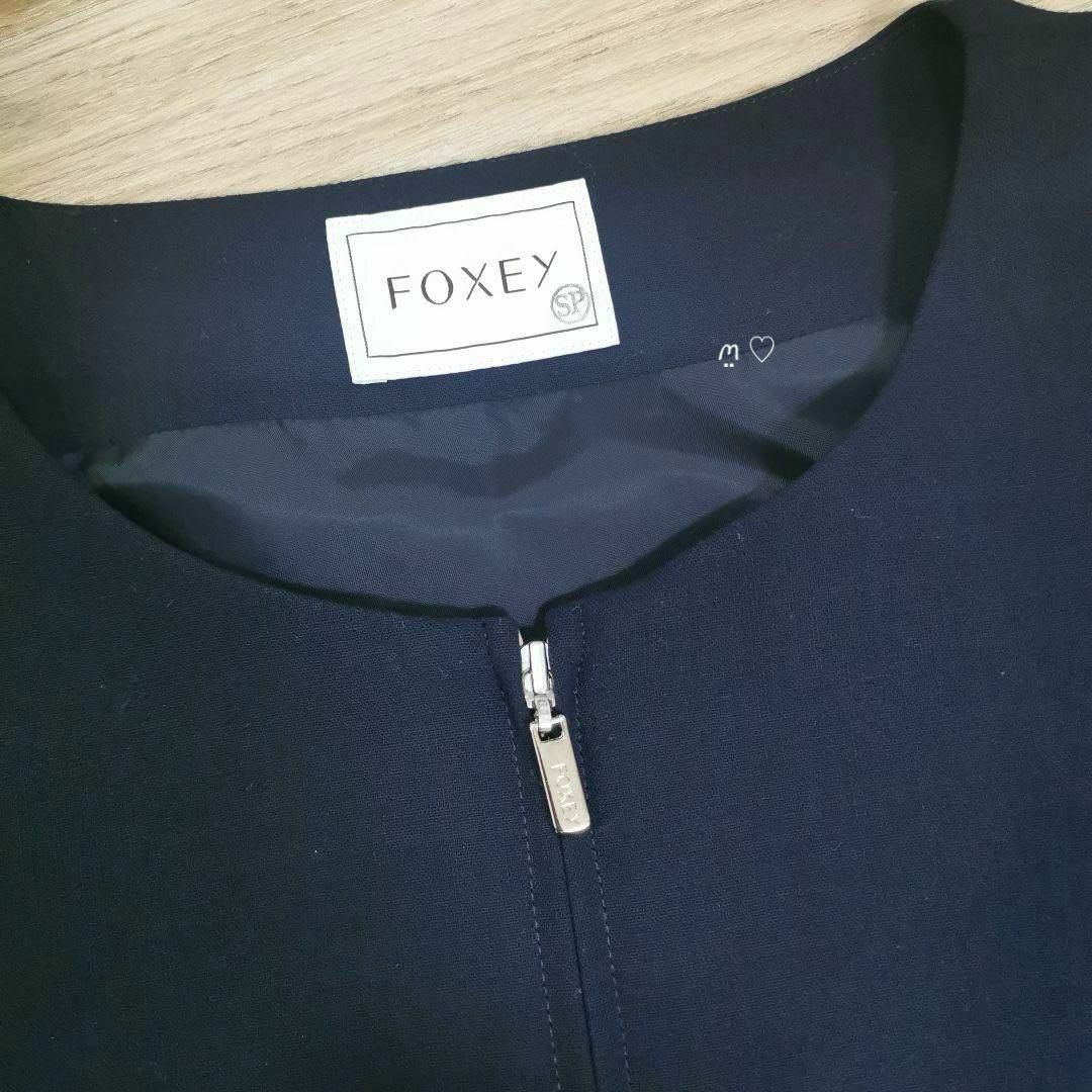 FOXEY(フォクシー)のFOXEY　フォクシー　袖口リボンジャケット　38　ミッドナイトブルー　羽織り レディースのジャケット/アウター(ノーカラージャケット)の商品写真