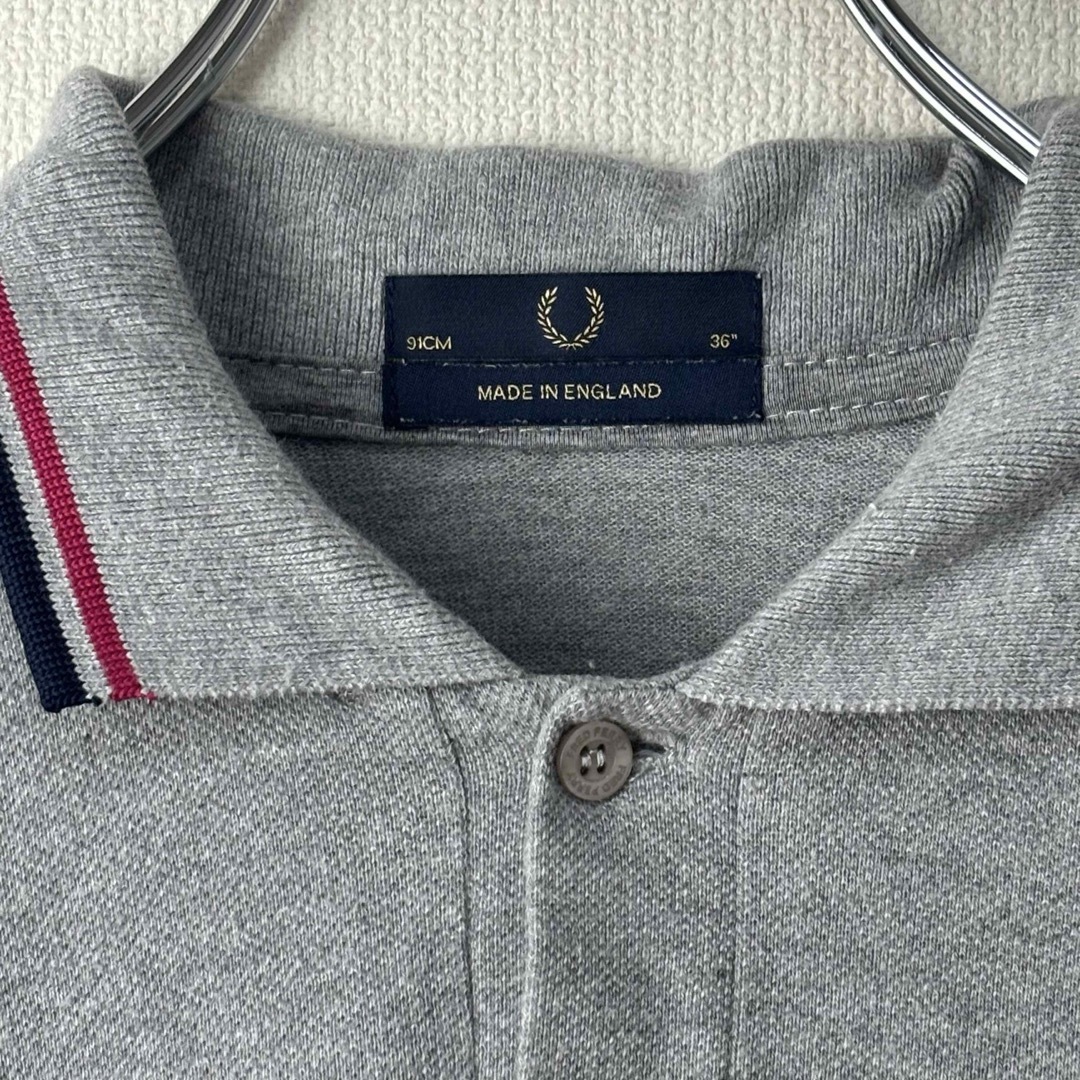 FRED PERRY(フレッドペリー)の人気　フレッドペリー　ポロシャツ　英国製　M12  36 S グレー　古着 メンズのトップス(ポロシャツ)の商品写真