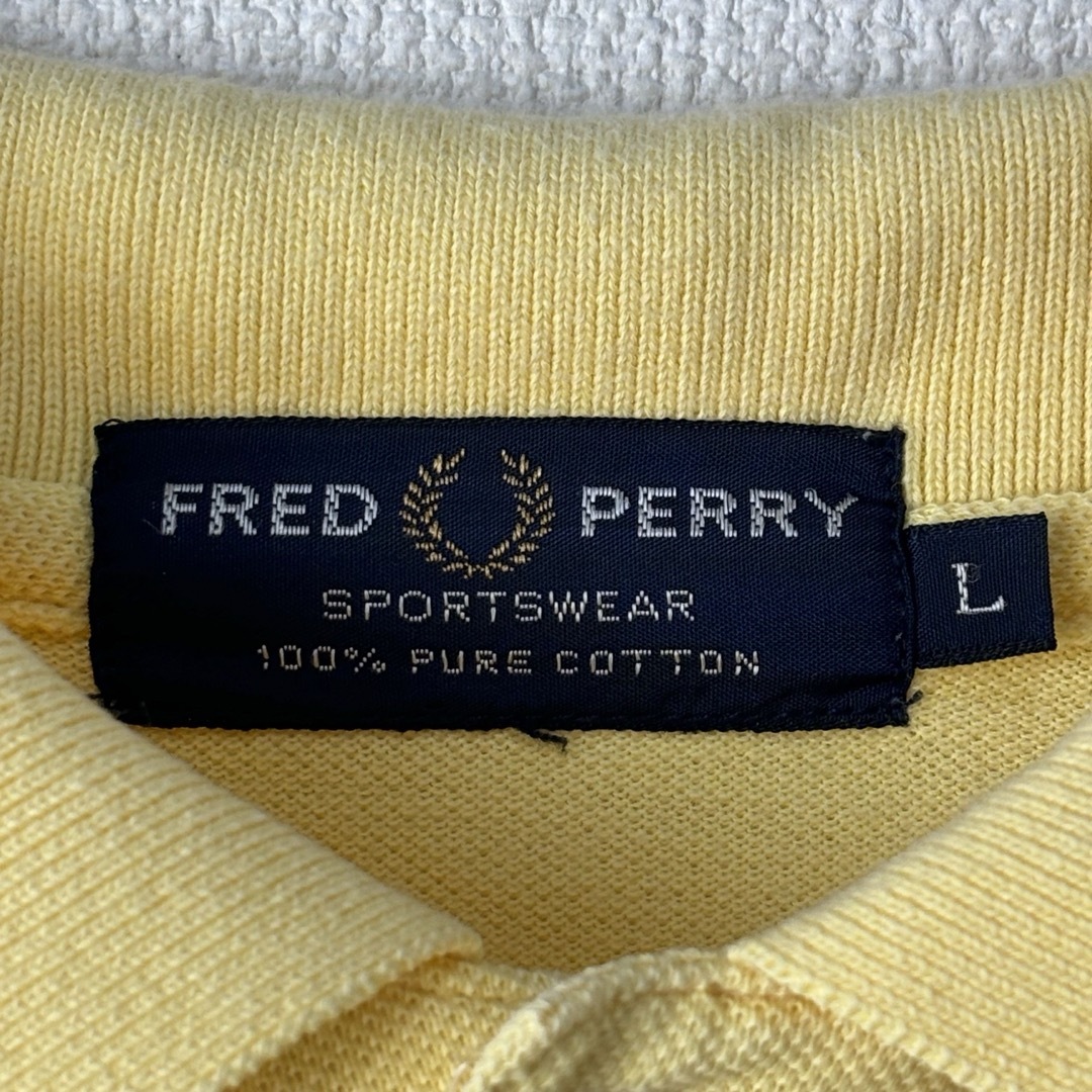 FRED PERRY(フレッドペリー)の人気　フレッドペリー　ポロシャツ　ビンテージ　スポーツウェア　L イエロー　古着 メンズのトップス(ポロシャツ)の商品写真