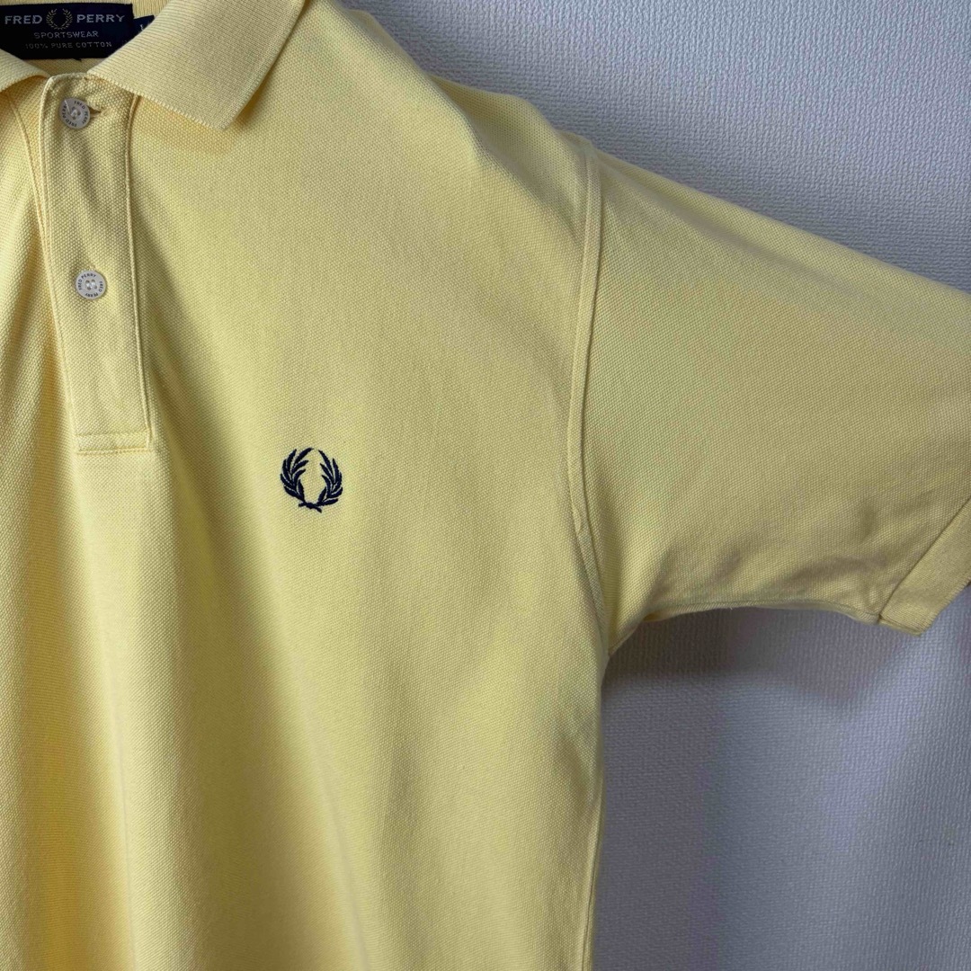 FRED PERRY(フレッドペリー)の人気　フレッドペリー　ポロシャツ　ビンテージ　スポーツウェア　L イエロー　古着 メンズのトップス(ポロシャツ)の商品写真