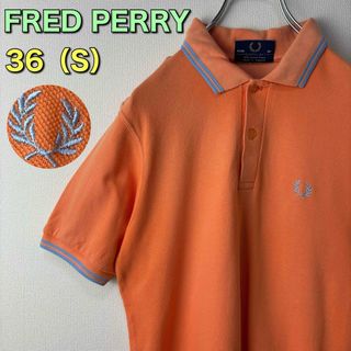 フレッドペリー(FRED PERRY)の人気　フレッドペリー　ポロシャツ　英国製　M12  オレンジ　36 S 古着(ポロシャツ)