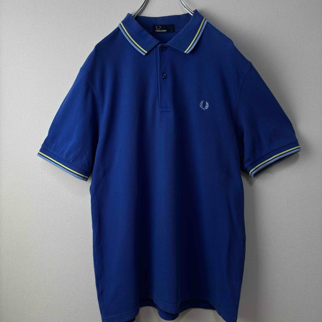 FRED PERRY(フレッドペリー)の人気　フレッドペリー　ポロシャツ　L ブルー　イエロー　古着 メンズのトップス(ポロシャツ)の商品写真