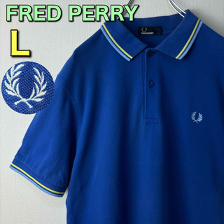 フレッドペリー(FRED PERRY)の人気　フレッドペリー　ポロシャツ　L ブルー　イエロー　古着(ポロシャツ)