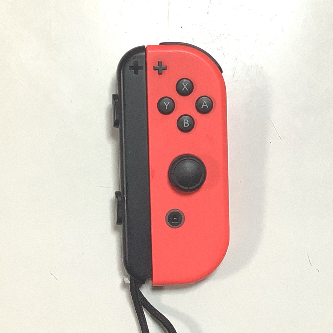 Nintendo Switch(ニンテンドースイッチ)のSwitch Joy-Con ジャンク品 ネオンレッド（R） エンタメ/ホビーのゲームソフト/ゲーム機本体(その他)の商品写真