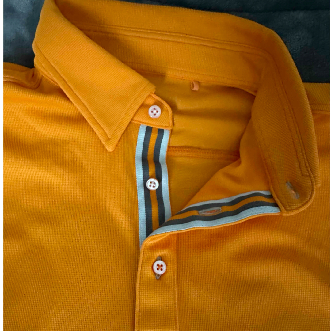UNIQLO(ユニクロ)のUNIQLO 半袖ポロシャツLサイズ オレンジ スポーツ/アウトドアのゴルフ(ウエア)の商品写真
