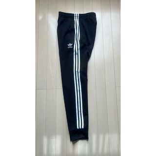 オリジナルス(Originals（adidas）)のアディカラー クラシックス カフ トラックパンツ サイズ M(トレーニング用品)