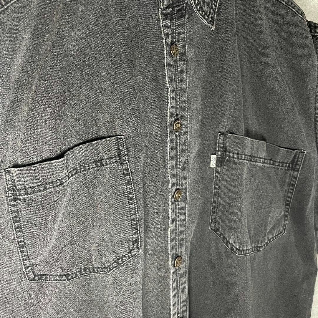 Levi's(リーバイス)の[古着]リーバイス　ベスト　フェード　刻印　白タブ　ダブルポケット　アメカジ　黒 メンズのトップス(ベスト)の商品写真