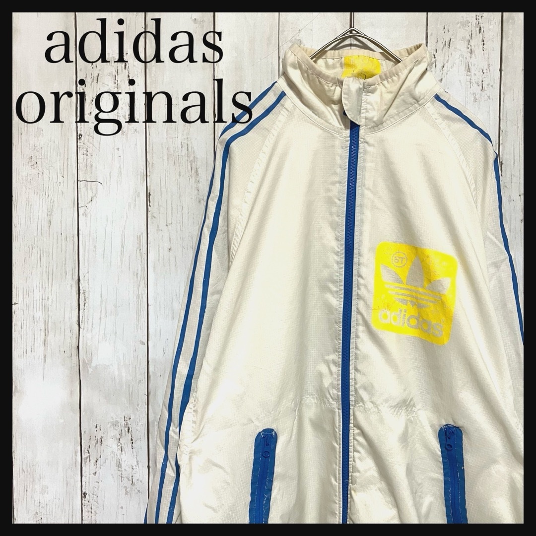 Originals（adidas）(オリジナルス)のアディダスオリジナルス ナイロンジャケットワンポイントバックプリントZ1083 メンズのジャケット/アウター(ナイロンジャケット)の商品写真