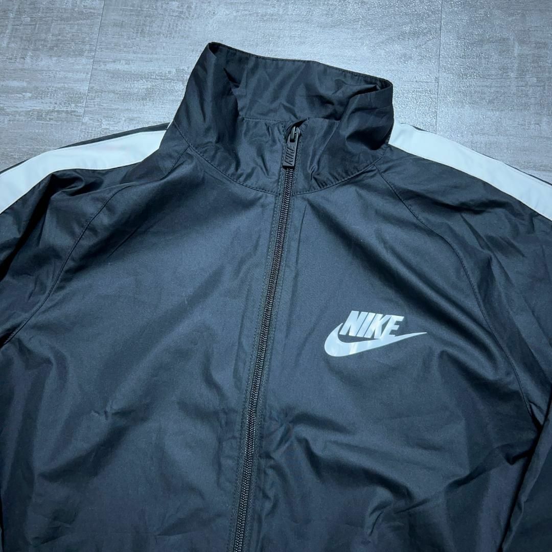 NIKE(ナイキ)のNIKE ナイキ ウィンドブレーカー 上下 セットアップ 黒 ナイロンジャケット レディースのジャケット/アウター(ブルゾン)の商品写真