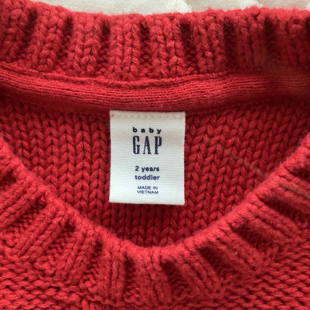 babyGAP(ベビーギャップ)のGAP　ポンポン付きニット キッズ/ベビー/マタニティのキッズ服女の子用(90cm~)(ニット)の商品写真