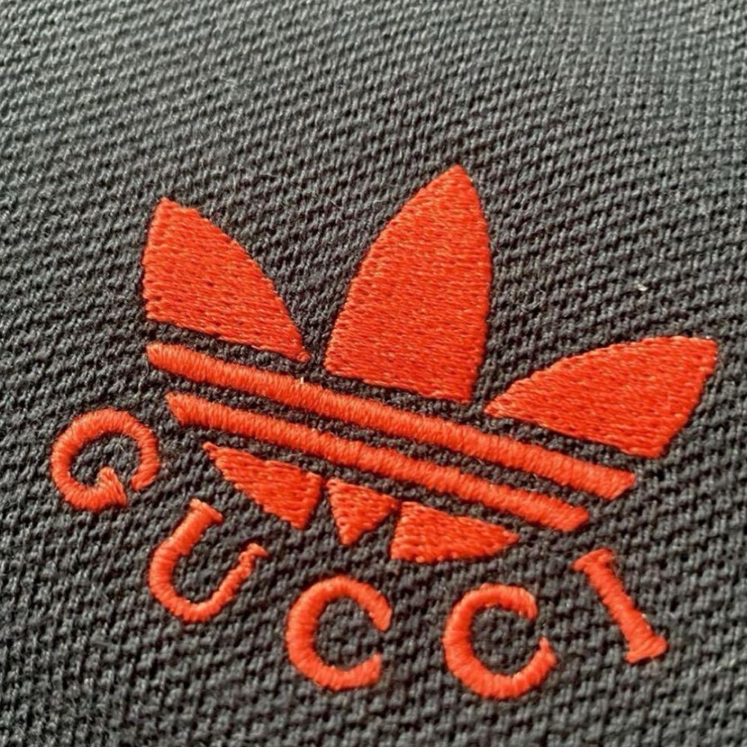 Gucci(グッチ)の【新品未使用】グッチGUCCIadidasコラボ　ネイビーＳサイズ メンズのトップス(Tシャツ/カットソー(半袖/袖なし))の商品写真