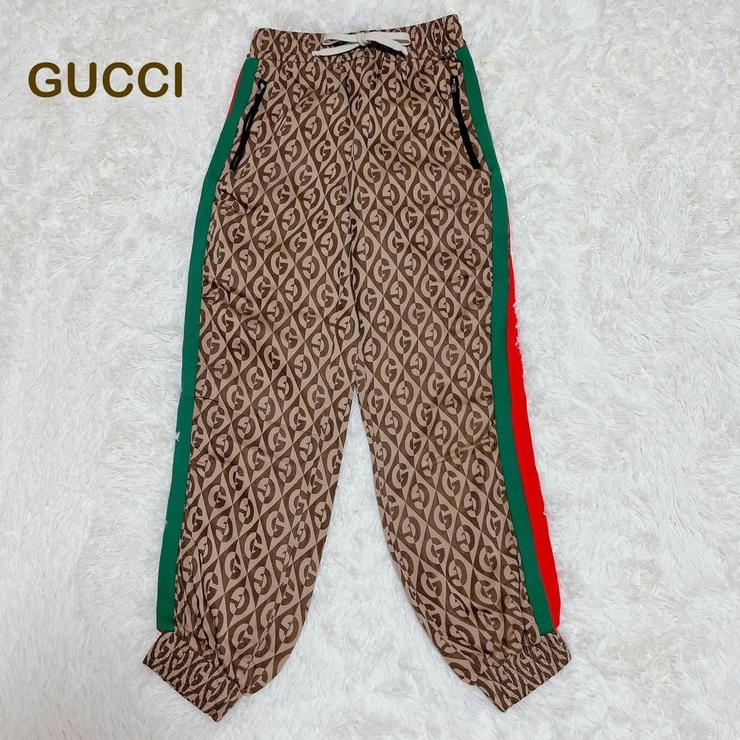 Gucci(グッチ)の高級✨現行　グッチ　トラックパンツ　シェリーライン　GG  総柄　ブラウン　S レディースのパンツ(カジュアルパンツ)の商品写真