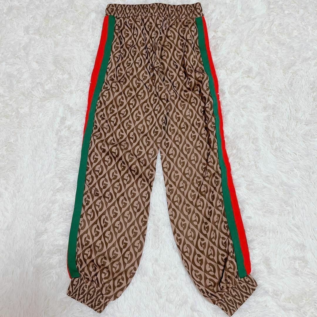 Gucci(グッチ)の高級✨現行　グッチ　トラックパンツ　シェリーライン　GG  総柄　ブラウン　S レディースのパンツ(カジュアルパンツ)の商品写真