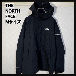 ザノースフェイス(THE NORTH FACE)の【ノースフェイス】マウンテンパーカー　黒ブラック刺繍　肩ロゴ　ワンポイント１R(マウンテンパーカー)