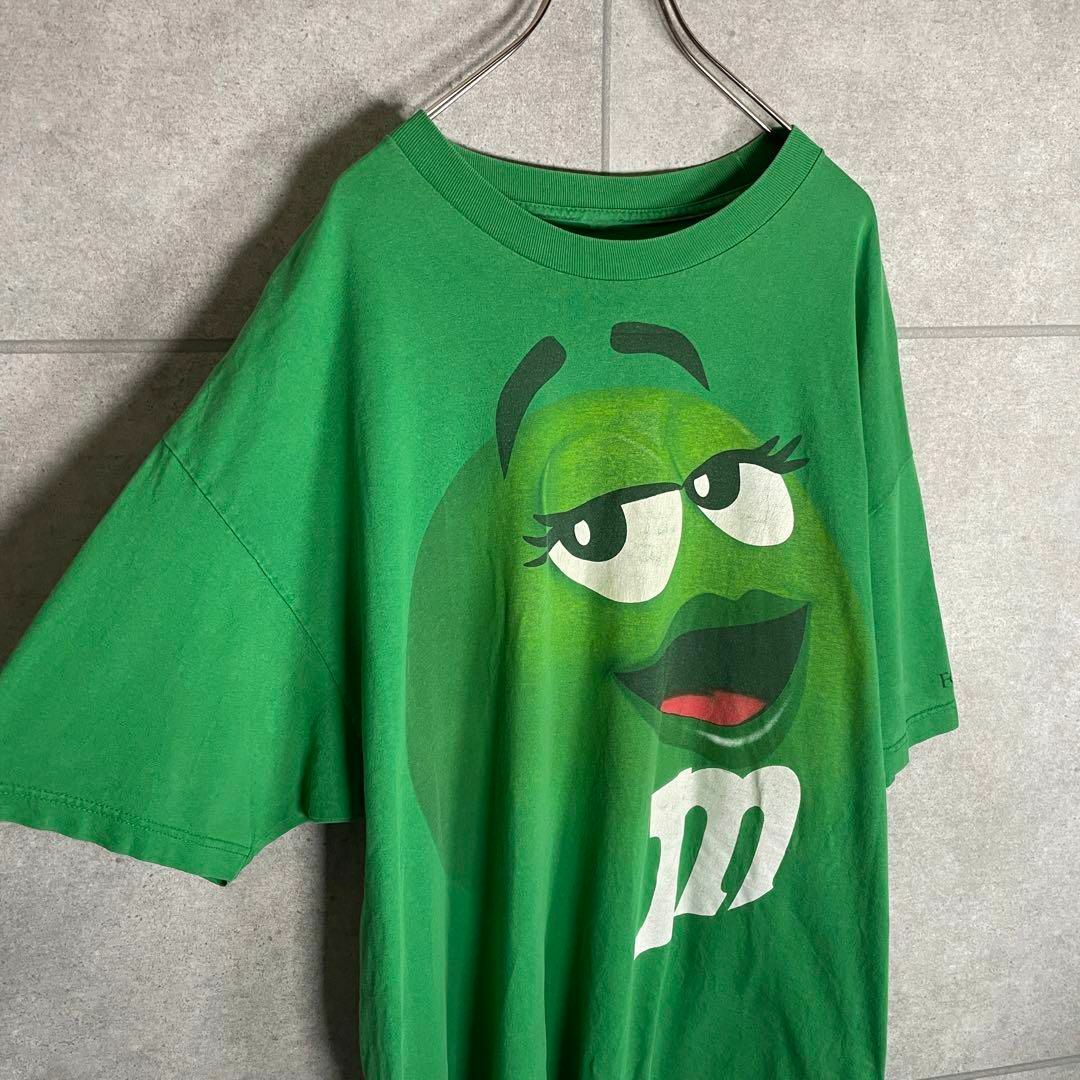 m&m&m's(エムアンドエムアンドエムズ)の[古着]M&M's　半袖　Tシャツ　チョコレート　キャラ　プリント　グリーン メンズのトップス(Tシャツ/カットソー(半袖/袖なし))の商品写真