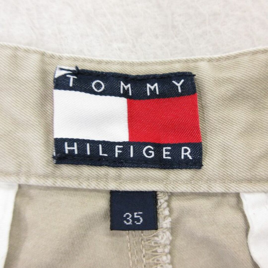 TOMMY HILFIGER(トミーヒルフィガー)のW36★古着 トミーヒルフィガー TOMMY HILFIGER ブランド ショート チノ パンツ ショーツ チノパン メンズ 90年代 90s ワンポイントロゴ コットン ベージュ カーキ 22apr01 中古 ボトムス 短パン ショーパン メンズのパンツ(ワークパンツ/カーゴパンツ)の商品写真