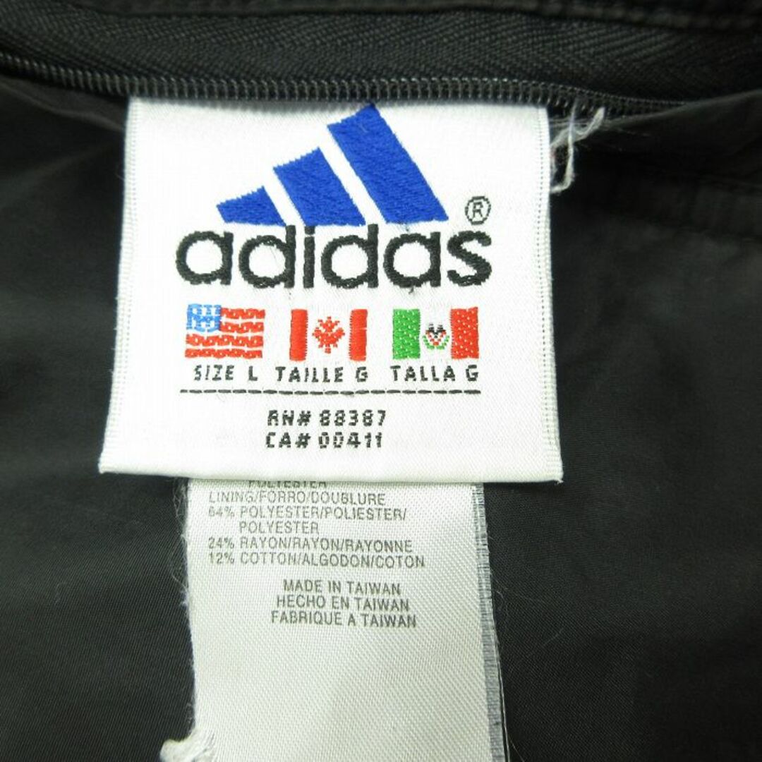 adidas(アディダス)の古着 アディダス adidas 長袖 ナイロン ジャケット パーカー キッズ ボーイズ 子供服 90年代 90s ビッグロゴ リバーシブル 黒他 ブラック 3本ライン 22oct11 キッズ/ベビー/マタニティのベビー服(~85cm)(シャツ/カットソー)の商品写真