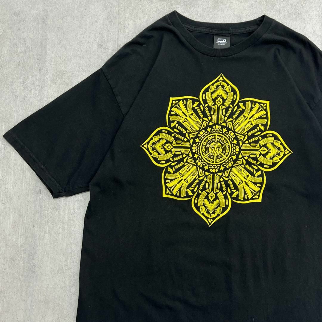 OBEY(オベイ)のOBEY　オベイ　プリントTシャツ　半袖Tシャツ　古着　ブラック　L メンズのトップス(Tシャツ/カットソー(半袖/袖なし))の商品写真