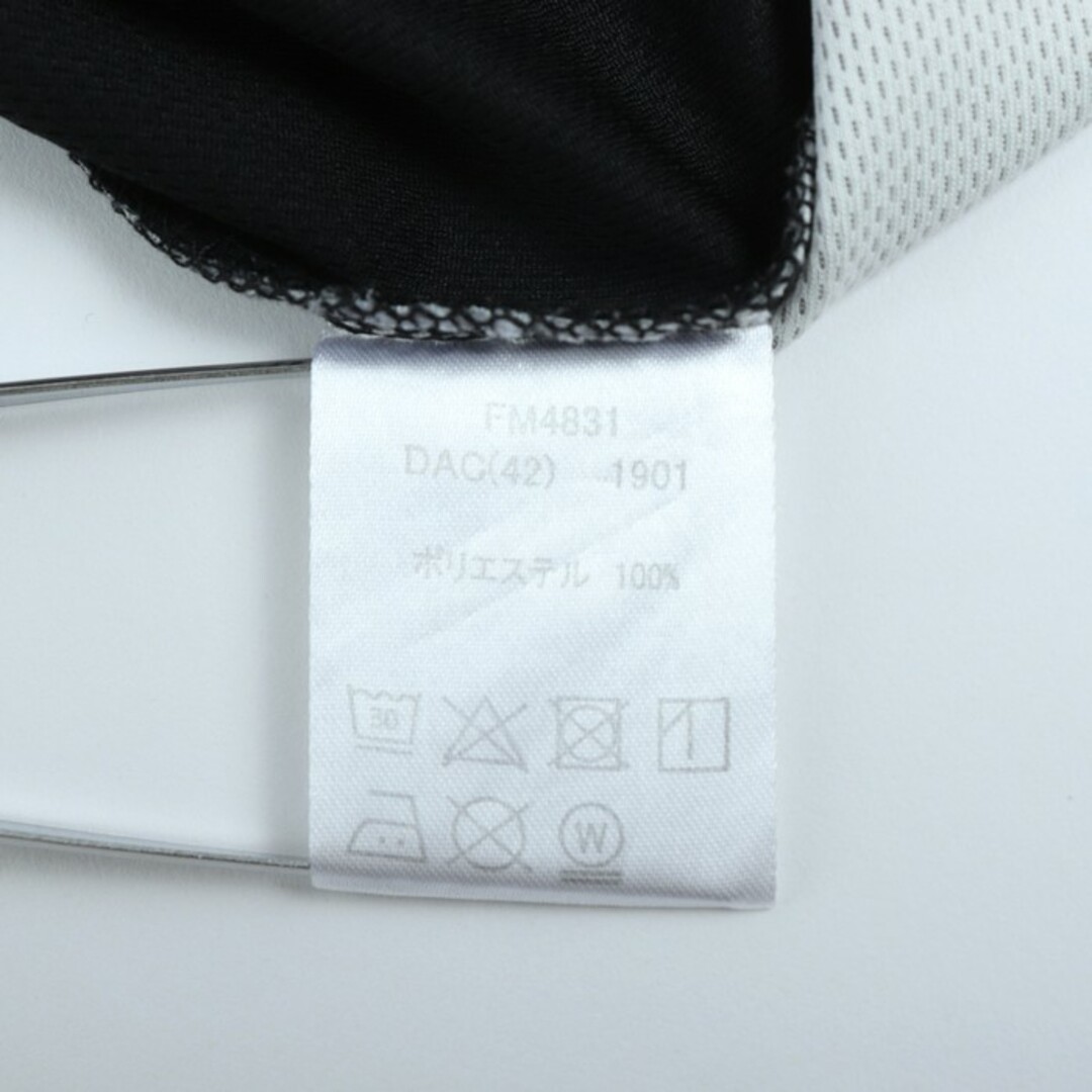 FILA(フィラ)のフィラ 半袖ポロシャツ ハイネック ハーフジップ ゴルフウエア メンズ Lサイズ ブラック×グレー FILA メンズのトップス(ポロシャツ)の商品写真