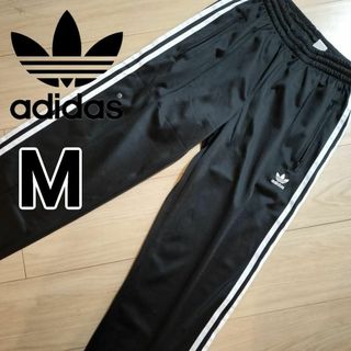 オリジナルス(Originals（adidas）)のアディダス 黒 ファイヤーバード トラックパンツ ジャージ下 女性M スリット(その他)