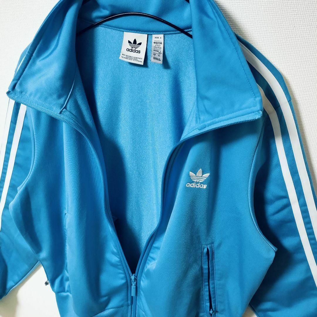 Originals（adidas）(オリジナルス)のadidas 青 ファイヤーバード 襟高 トラックトップ ジャージ 女性XOT レディースのトップス(その他)の商品写真