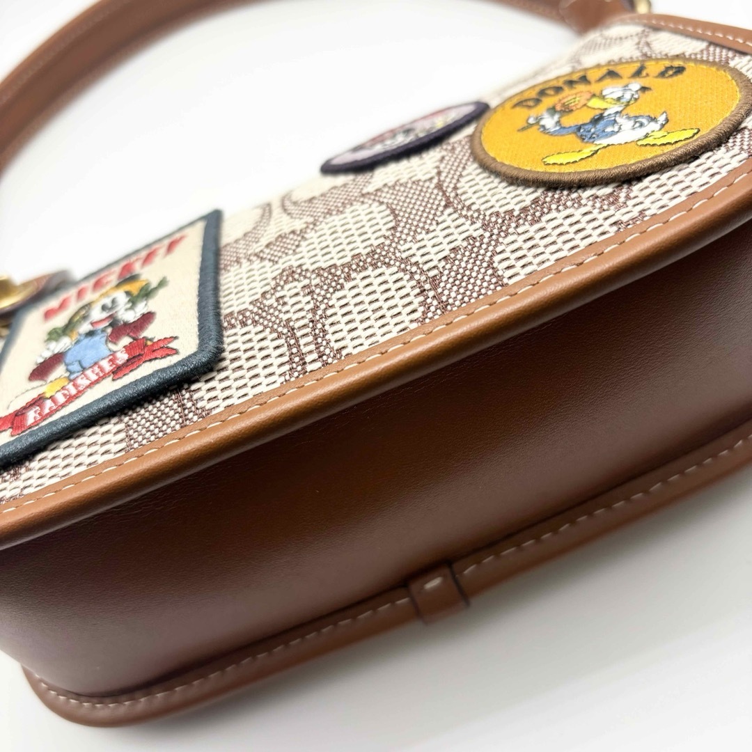 COACH(コーチ)の【DISNEY X COACH】スウィンガー 20・シグネチャー！ハンドバッグ！ レディースのバッグ(ハンドバッグ)の商品写真