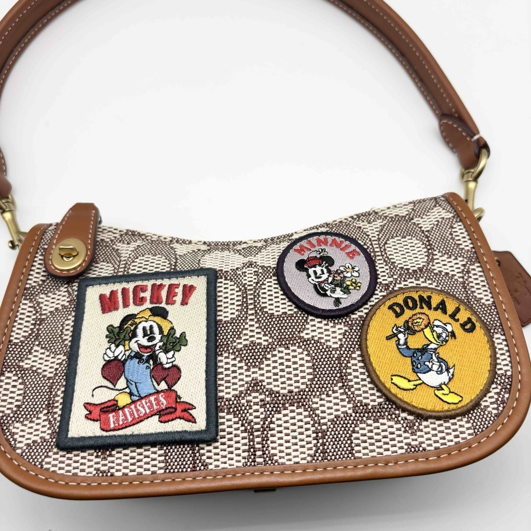 COACH(コーチ)の【DISNEY X COACH】スウィンガー 20・シグネチャー！ハンドバッグ！ レディースのバッグ(ハンドバッグ)の商品写真