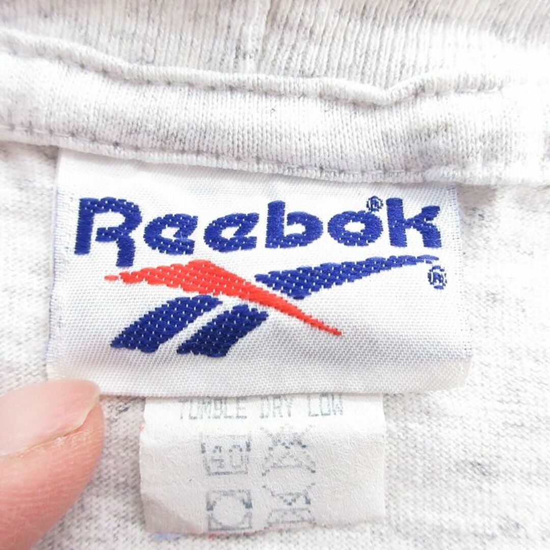 Reebok(リーボック)のXL★古着 リーボック REEBOK 長袖 ビンテージ Tシャツ メンズ 90年代 90s ワンポイントロゴ 大きいサイズ ロング丈 モックネック ハイネック カナダ製 薄グレー 霜降り 23apr13 中古 メンズのトップス(Tシャツ/カットソー(半袖/袖なし))の商品写真