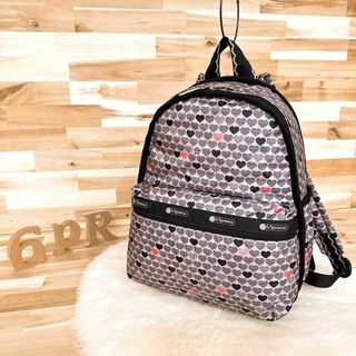 レスポートサック(LeSportsac)の美品【レスポートサック】ハート 総柄 リュック フリル柄 love ベージュ×黒(リュック/バックパック)