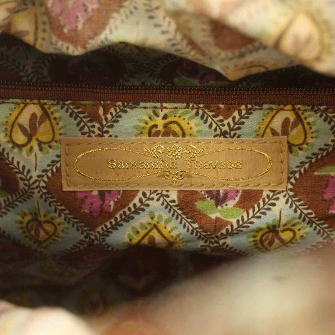 Samantha Thavasa(サマンサタバサ)のサマンサタバサ かごバッグ ハンドバッグ 編み込み ロゴ ハート型チャーム 茶 レディースのバッグ(かごバッグ/ストローバッグ)の商品写真