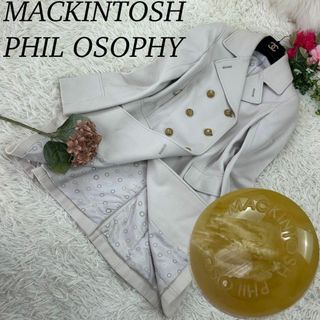 マッキントッシュフィロソフィー(MACKINTOSH PHILOSOPHY)のマッキントッシュ ソロフィー レディース Sサイズ ロングコート ロゴボタン(ロングコート)