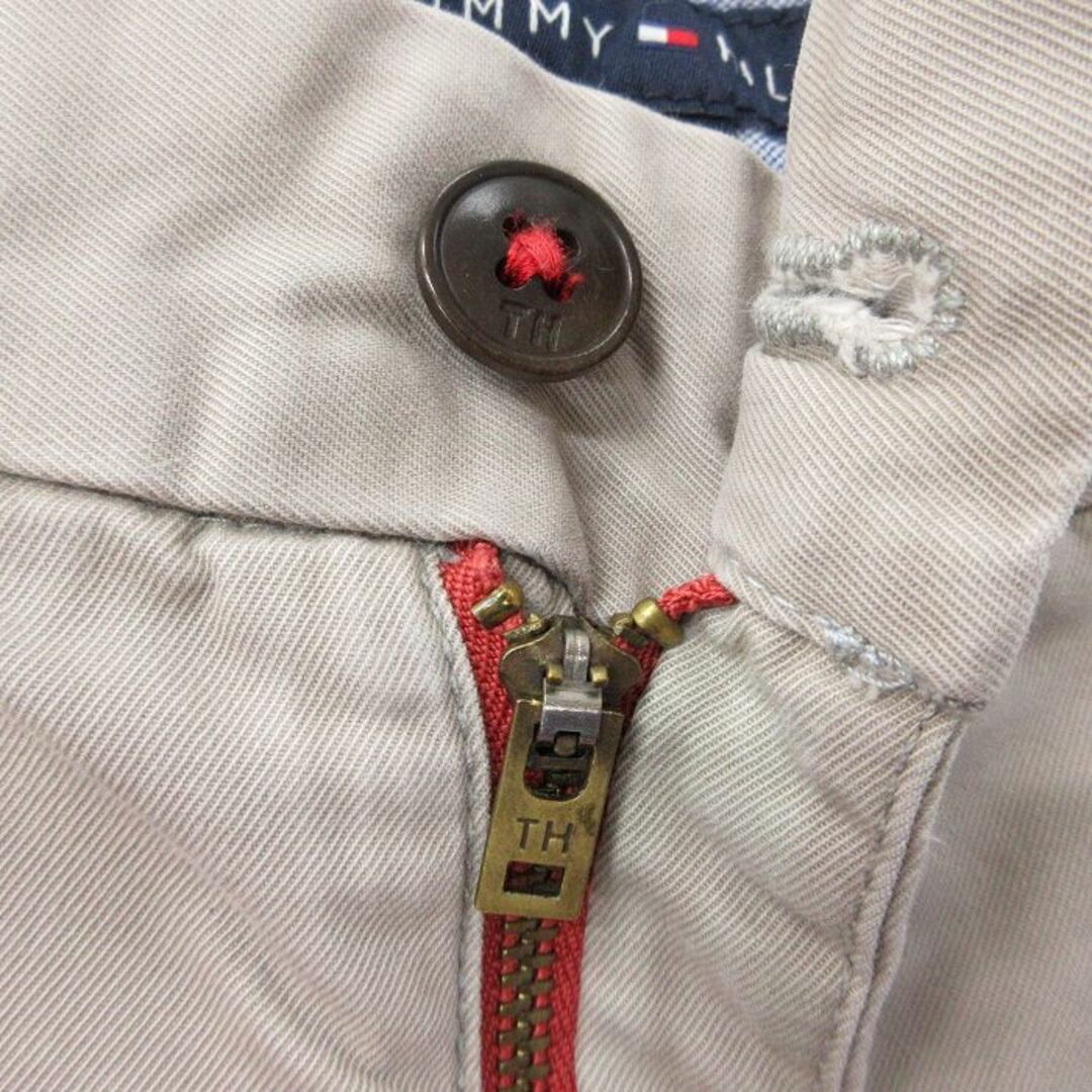 TOMMY HILFIGER(トミーヒルフィガー)のW34★古着 トミーヒルフィガー TOMMY HILFIGER ブランド ショート パンツ ショーツ メンズ ワンポイントロゴ コットン 薄ベージュ カーキ 23jun08 中古 ボトムス 短パン ショーパン ハーフ メンズのパンツ(ワークパンツ/カーゴパンツ)の商品写真