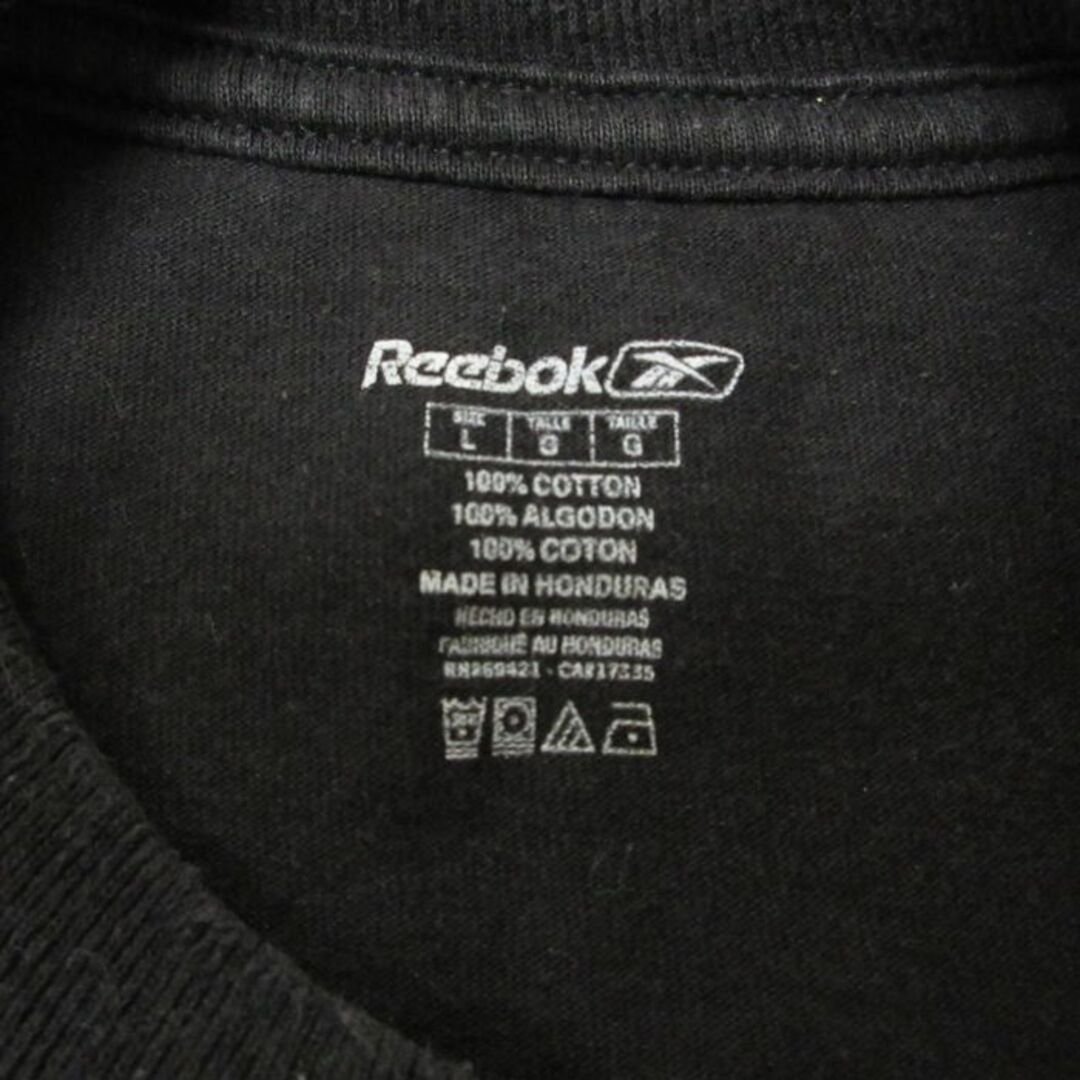 Reebok(リーボック)のXL★古着 リーボック REEBOK 半袖 ブランド Tシャツ メンズ NFL ニューヨークジャイアンツ イーライマニング 10 コットン クルーネック 黒 ブラック アメフト スーパーボウル 23jun09 中古 メンズのトップス(Tシャツ/カットソー(半袖/袖なし))の商品写真