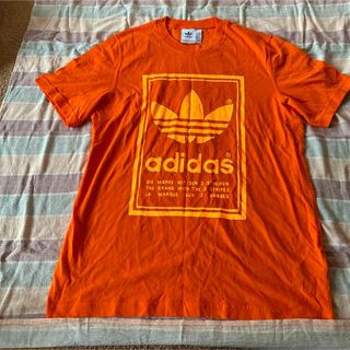 アディダス(adidas)の新品　アディダス　adidas Tシャツ　サイズO オレンジ(Tシャツ/カットソー(半袖/袖なし))