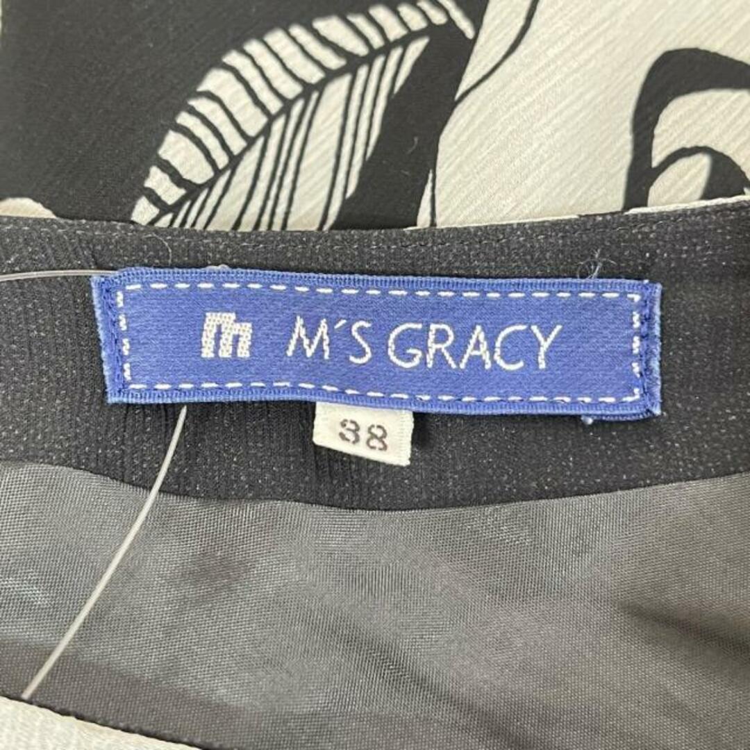 M'S GRACY(エムズグレイシー)のM'S GRACY(エムズグレイシー) スカート サイズ38 M レディース - 黒×白×ゴールド ひざ丈/花柄 レディースのスカート(その他)の商品写真