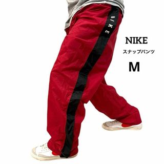 NIKE - NIKE ナイキ 古着 ナイロンパンツ スナップパンツ サイドライン M