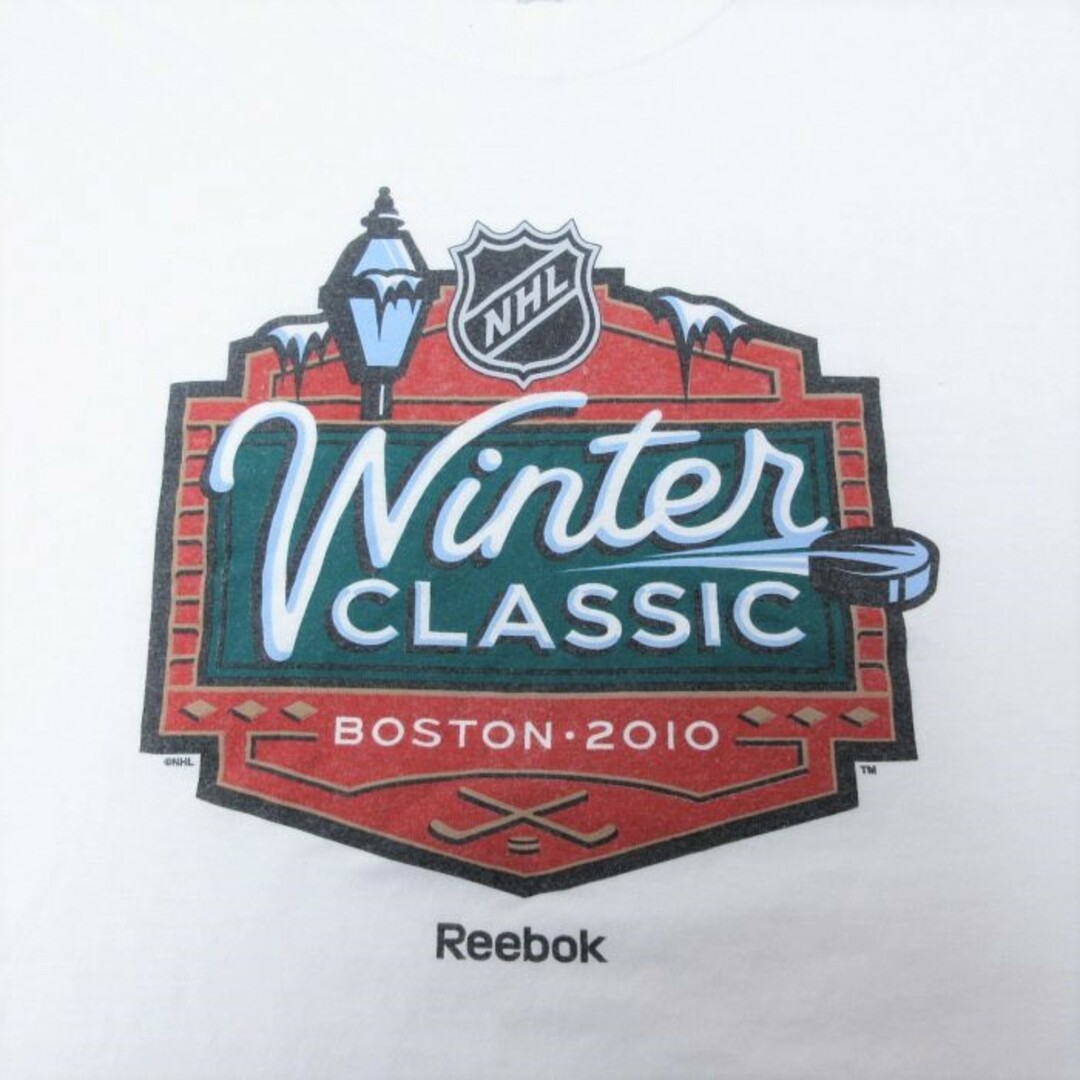 Reebok(リーボック)のXL★古着 リーボック REEBOK 半袖 ブランド Tシャツ メンズ NHL ウィンタークラシック ボストン コットン クルーネック 白 ホワイト アイスホッケー 23jul13 中古 メンズのトップス(Tシャツ/カットソー(半袖/袖なし))の商品写真