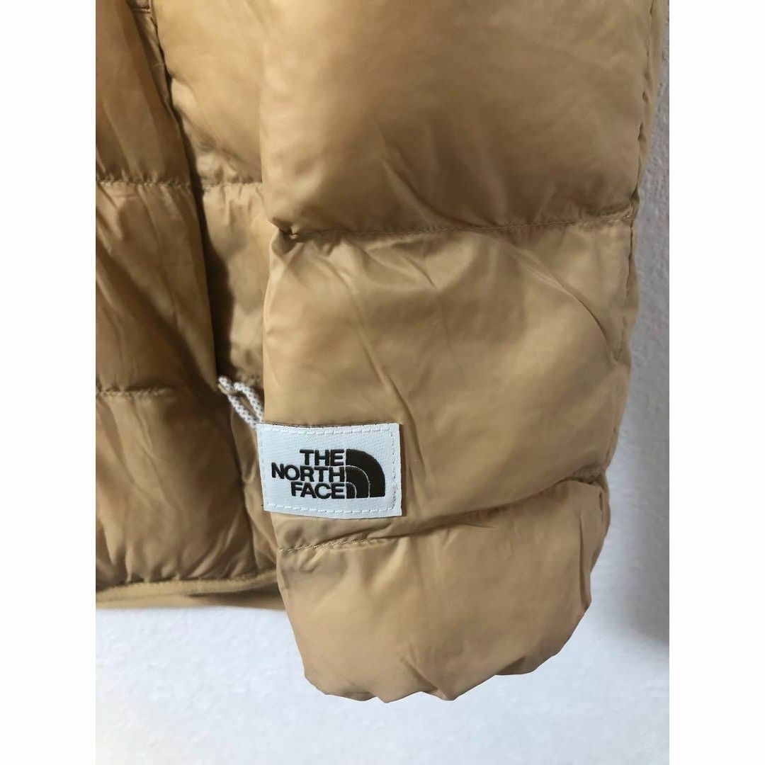 THE NORTH FACE(ザノースフェイス)のあんまん様専用！新品ノースフェイスレディースダウンゴールドベージュL 保村袋付 レディースのジャケット/アウター(ダウンジャケット)の商品写真