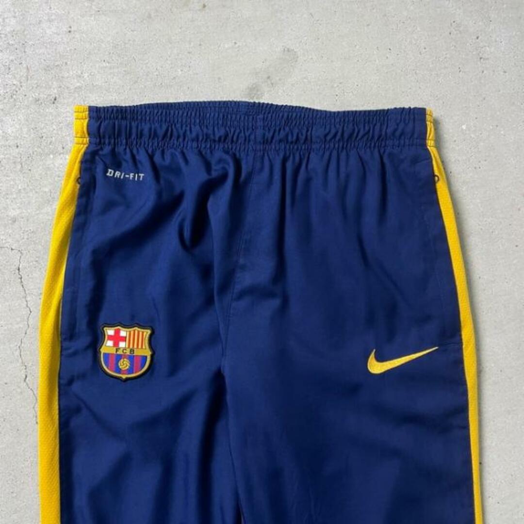 NIKE(ナイキ)のNIKE ナイキ DRY-FIT ジョグパンツ ウォームアップパンツ FCB ワッペン チーム メンズM メンズのパンツ(その他)の商品写真