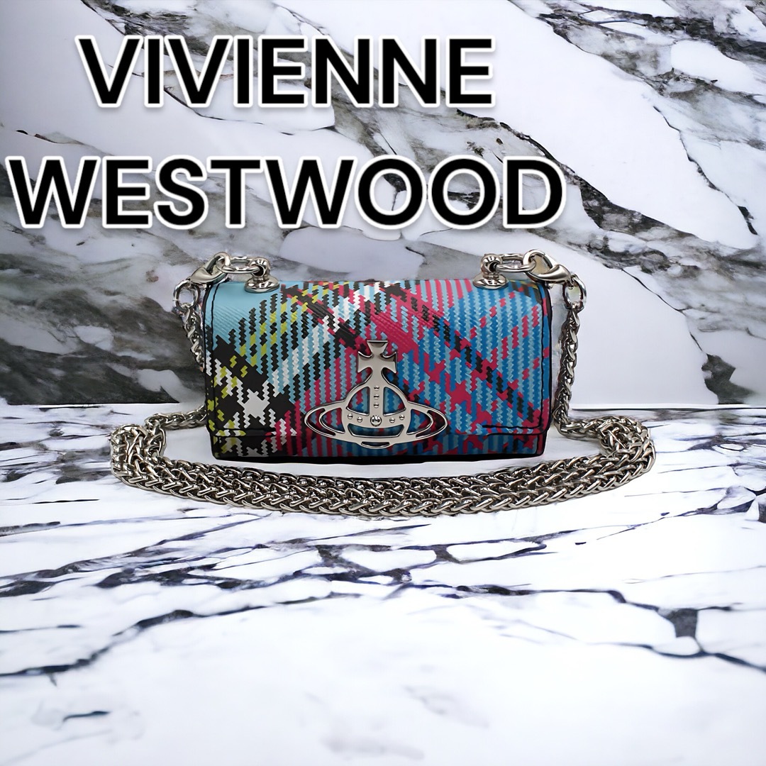 Vivienne Westwood(ヴィヴィアンウエストウッド)の【新品未使用】ヴィヴィアンウエストウッド【日本正規品】ポーチ　マルチチェック柄 レディースのファッション小物(財布)の商品写真