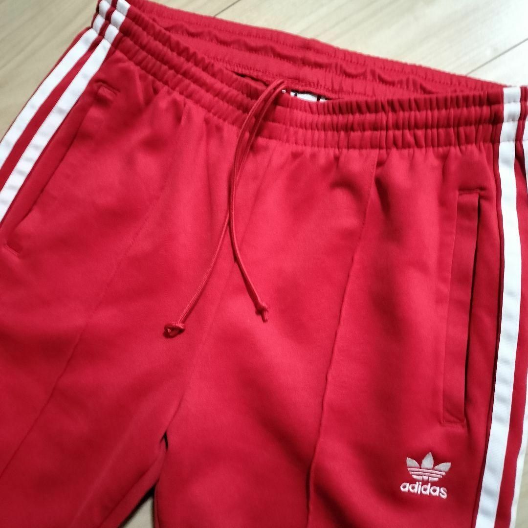 Originals（adidas）(オリジナルス)のアディダス 赤 スーパースター トラックパンツ ジャージ 女性XL スリムP レディースのパンツ(その他)の商品写真