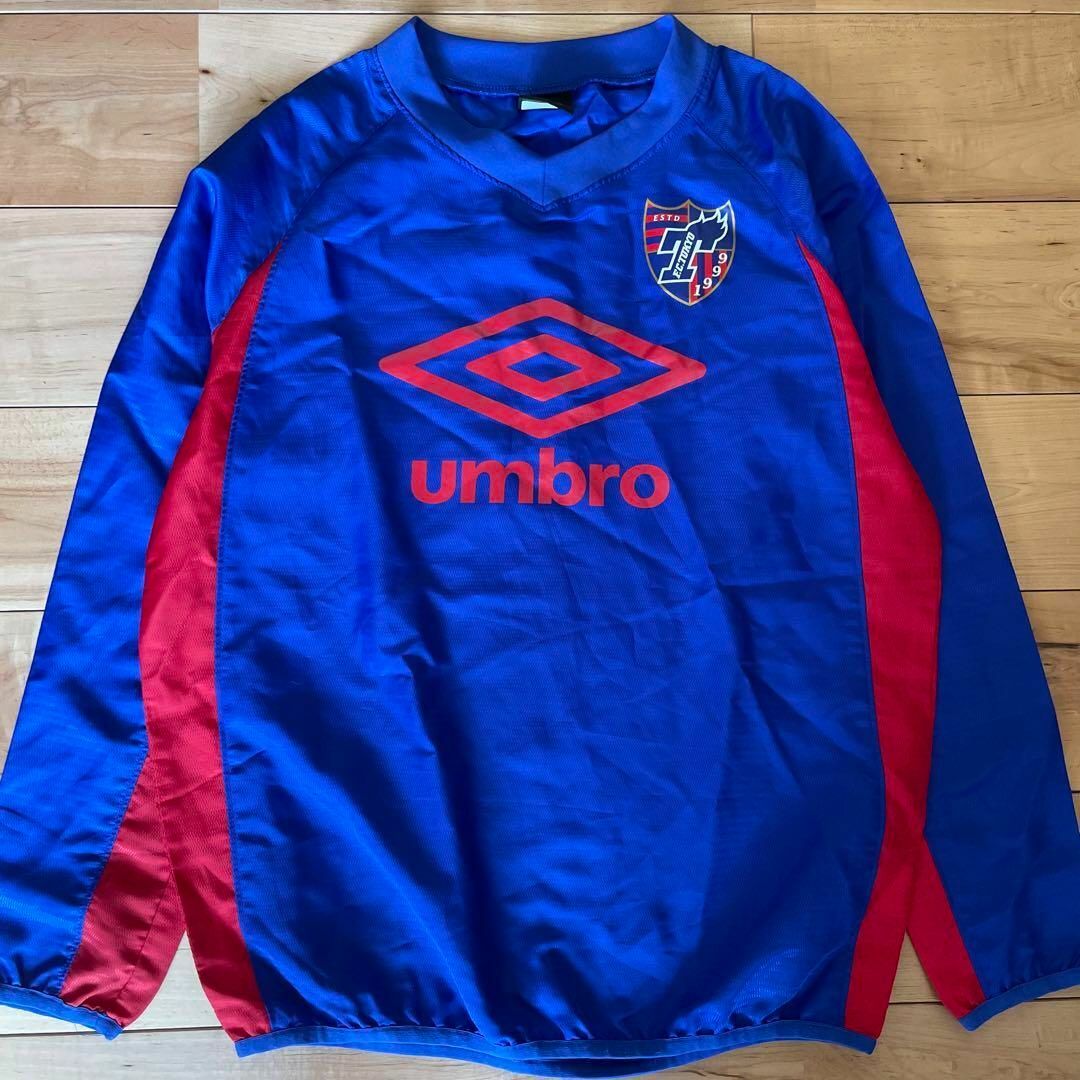 UMBRO(アンブロ)の★UMBROアンブロFC東京キッズジュニアピステジャケット150サイズ スポーツ/アウトドアのサッカー/フットサル(ウェア)の商品写真