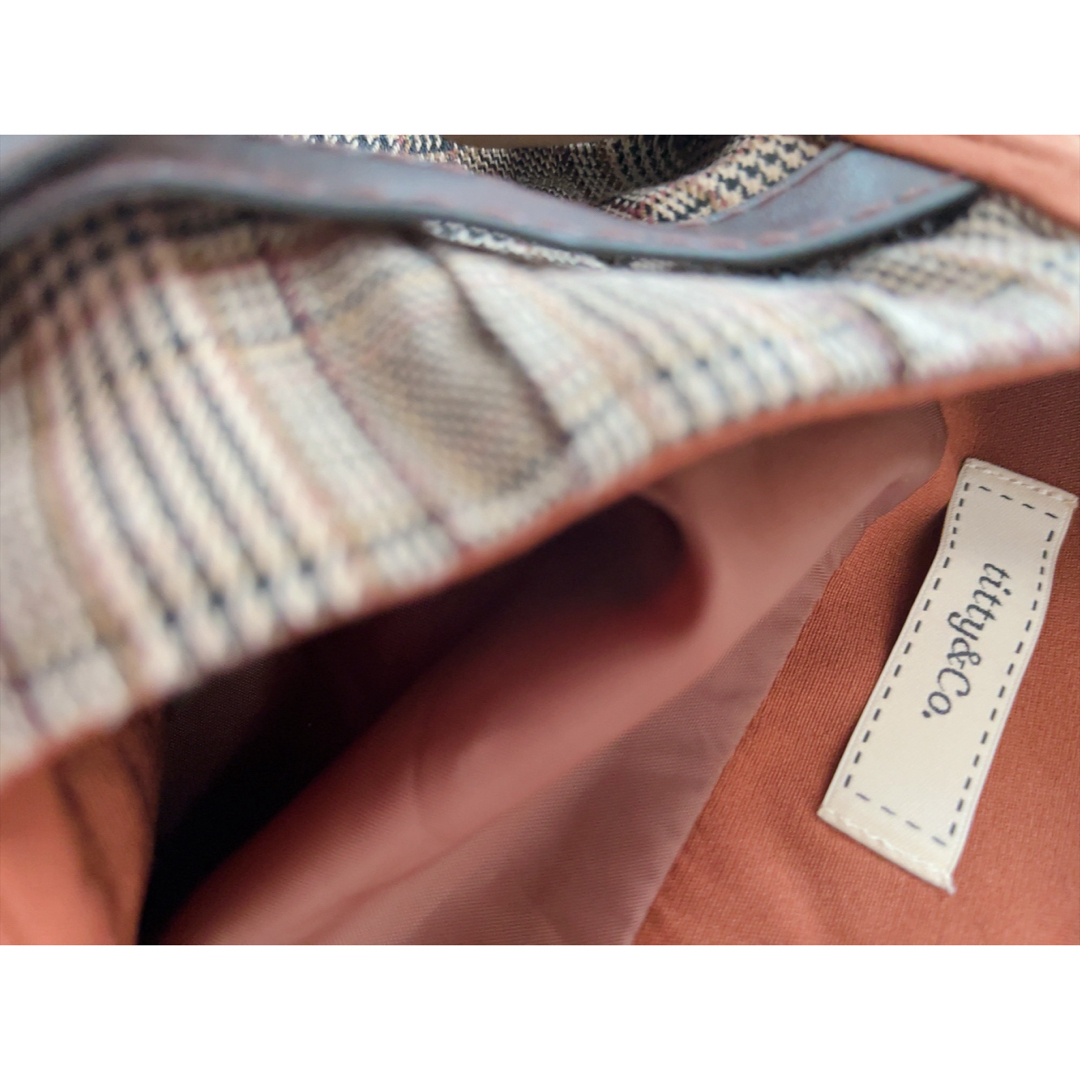 titty&co(ティティアンドコー)のティティアンドコー オレンジ ブラウン チェック 切り替え スカート レディースのスカート(ミニスカート)の商品写真