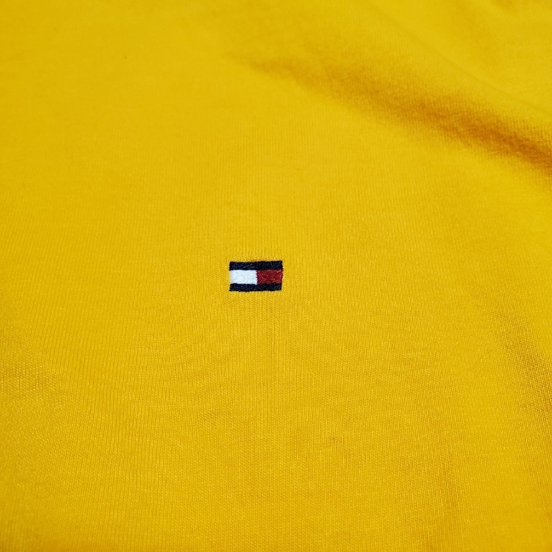 TOMMY HILFIGER(トミーヒルフィガー)のTOMMY HILFIGER　オレンジ　Tシャツ　古着　刺繍 メンズのトップス(シャツ)の商品写真