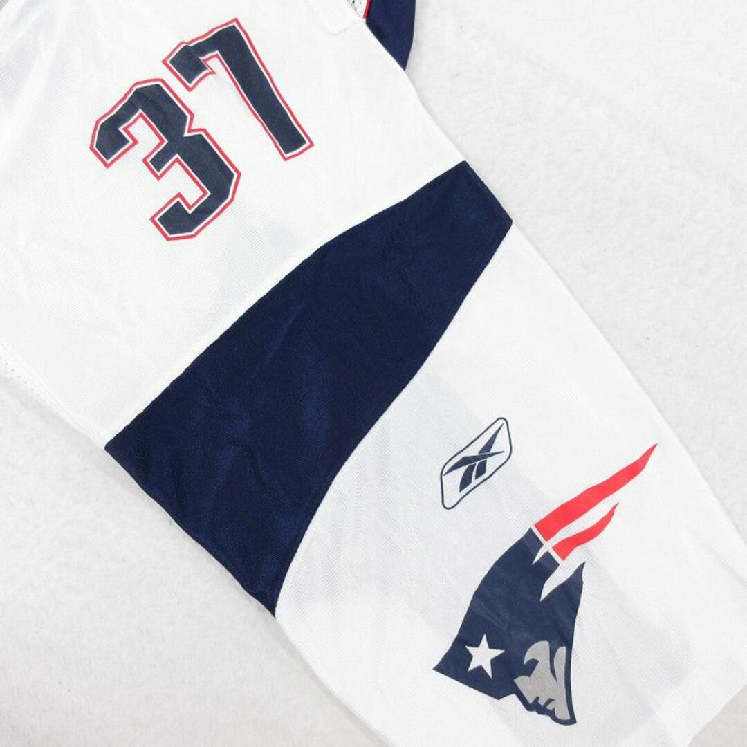 Reebok(リーボック)のXL★古着 リーボック REEBOK 長袖 ビンテージ フットボール Tシャツ メンズ 00年代 00s NFL ニューイングランドペイトリオッツ ロドニーハリソン 37 メッシュ地 大きいサイズ ロング丈 Vネック 白他 ホワイト アメフト スーパーボウル ユニフォーム ゲームシャツ 23aug23 中 メンズのトップス(Tシャツ/カットソー(半袖/袖なし))の商品写真