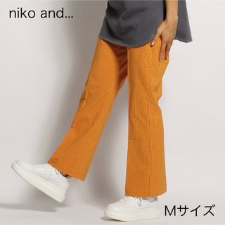 ニコアンド(niko and...)の美品 niko and フレアパンツ オレンジ ギンガムチェック(その他)