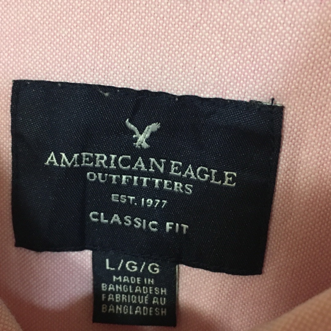 American Eagle(アメリカンイーグル)の【希少】アメリカンイーグル AE ピンク M ロゴ 長袖シャツ 古着 メンズのトップス(シャツ)の商品写真