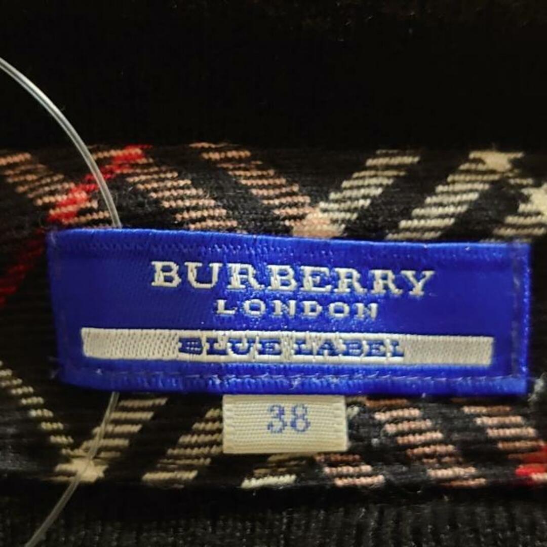 BURBERRY BLUE LABEL(バーバリーブルーレーベル)のBurberry Blue Label(バーバリーブルーレーベル) 半袖セーター サイズ28 L レディース - 黒×白×レッド 毛 レディースのトップス(ニット/セーター)の商品写真