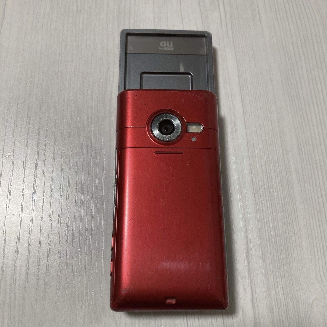 au(エーユー)のSANYO au WIN W31SA ガラケー 赤 NOKIA vodafone スマホ/家電/カメラのスマートフォン/携帯電話(携帯電話本体)の商品写真