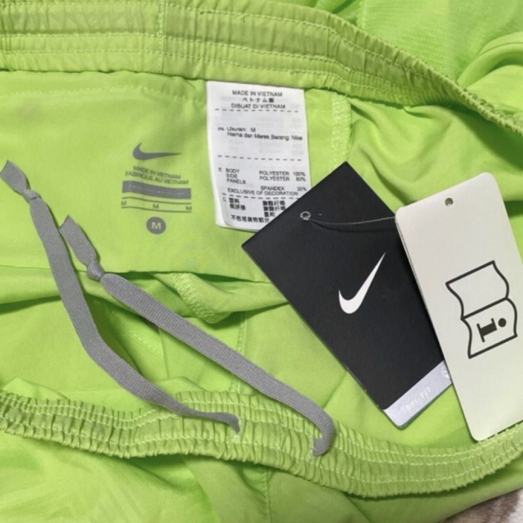 NIKE(ナイキ)のNIKE ナイキ ランニングウェア セットアップ レディース Ｍ スポーツ/アウトドアのランニング(ウェア)の商品写真